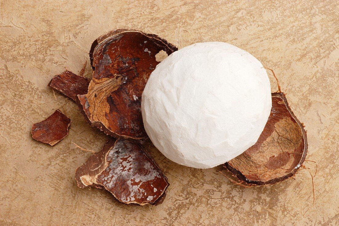 Effortlessly Removing Coconut Flesh From Its Shell: Two Simple Methods